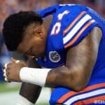 University of Florida defensive tackle Khairi Clark prays before the Florida Gators season opener against UMass in 2016- Florida Gators football- 1280x854