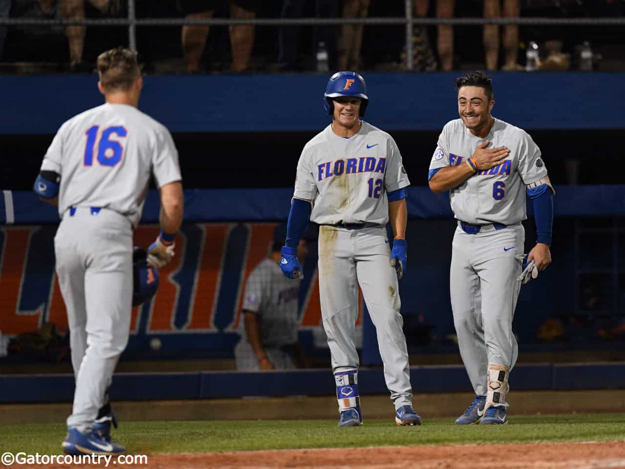 University of Florida third baseman Jonathan India and Blake Reese meet Wil  Dalton at the plate after his home run against Jacksonville in the  Gainesville Regional- Florida Gators baseball- 1280×853