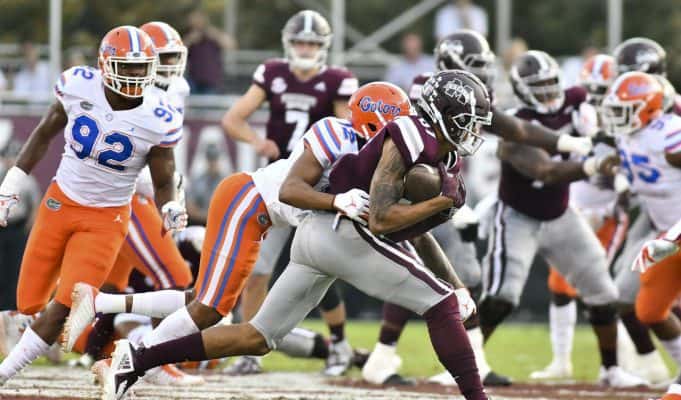 Florida Gators cornerback CJ McWilliams tackles the Mississippi State receiver- 1280x854