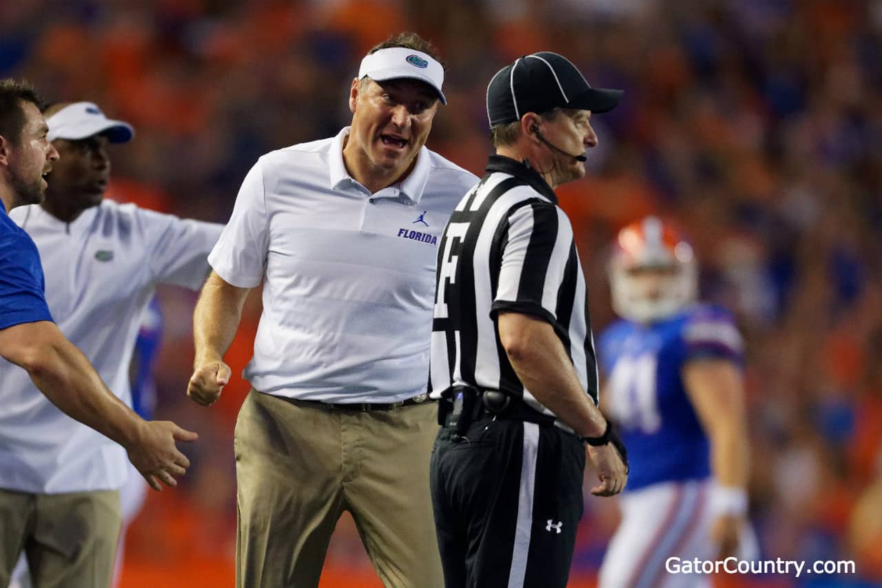 Florida Gators head coach Dan Mullen talks to the referee during the  Kentucky game 