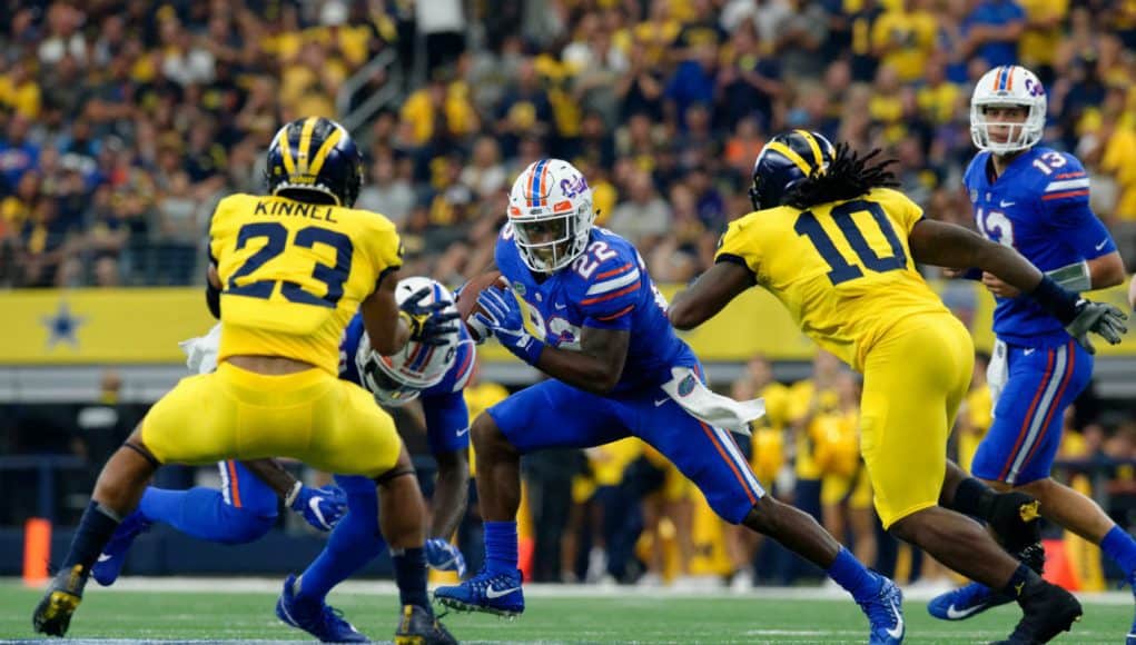 University of Florida running back Lamical Perine carries the ball in the AdvoCare Classic against the Michigan Wolverines- Florida Gators football- 1280x852