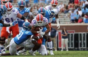 Malik Davis breaks a tackle against Ole Miss- 1186x820