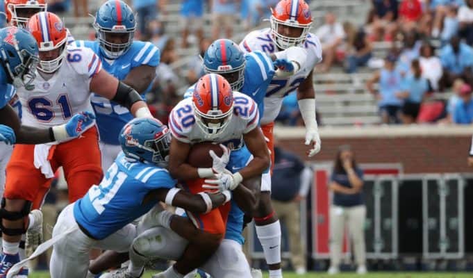 Malik Davis breaks a tackle against Ole Miss- 1186x820