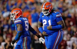 Florida Gators defensive lineman Desmond Watson recovers a fumble against South Carolina- 1280x853