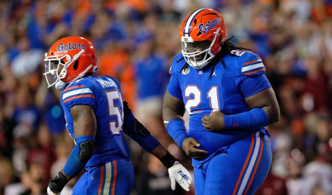 Florida Gators defensive lineman Desmond Watson recovers a fumble against South Carolina- 1280x853