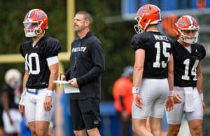 Florida Gators head coach Billy Napier with the quarterbacks during spring practice- 1280x853