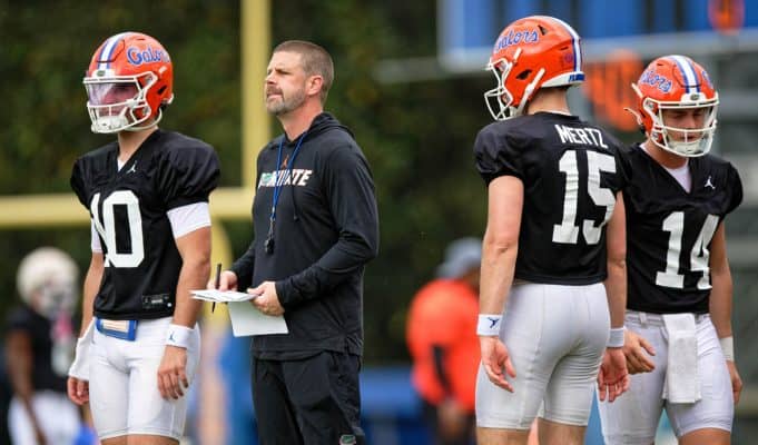 Florida Gators head coach Billy Napier with the quarterbacks during spring practice- 1280x853