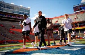 Florida Gators football head coach Billy Napier and the Gators walk into Ben Hill Griffin Stadium as they get ready for the 2023 Orange and Blue Game- 1280x853