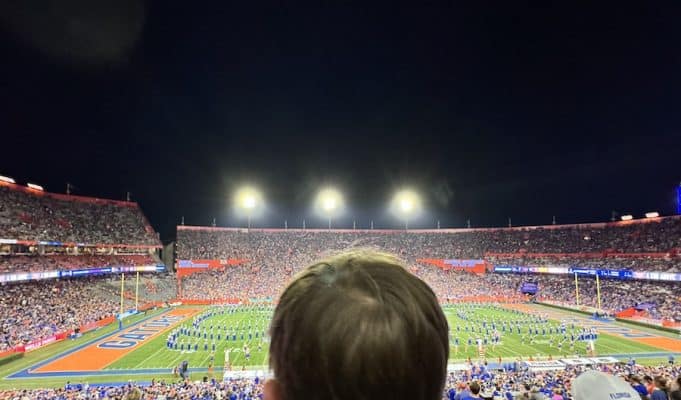 A child watches a halftime show at the Swamp, September 7, 2024