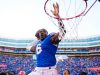 Linebacker Shemar James celebrates the win over Ole Miss by dunking the football-1280x853