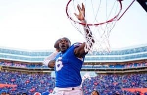 Linebacker Shemar James celebrates the win over Ole Miss by dunking the football-1280x853