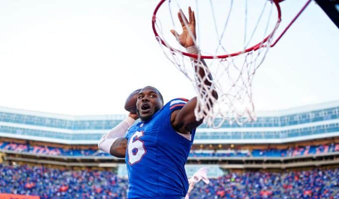 Linebacker Shemar James celebrates the win over Ole Miss by dunking the football-1280x853